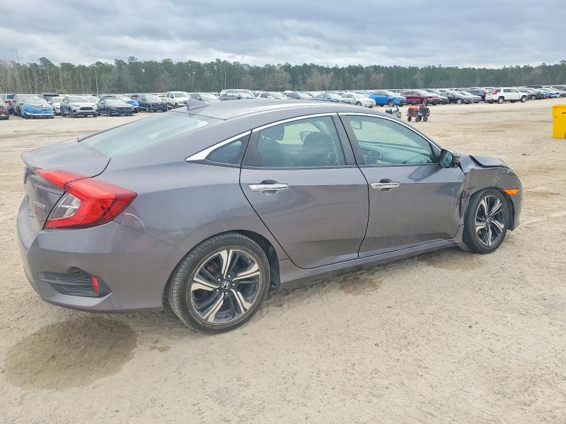 Photo 3 from auction – 2016 HONDA CIVIC TOUR with VIN 2HGFC1F9XGH636588