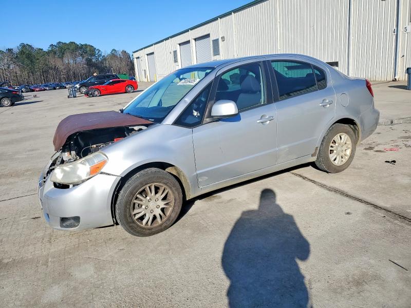SUZUKI SX4 LE 2012 with VIN JS2YC5A31C6302484 - Photo from auction