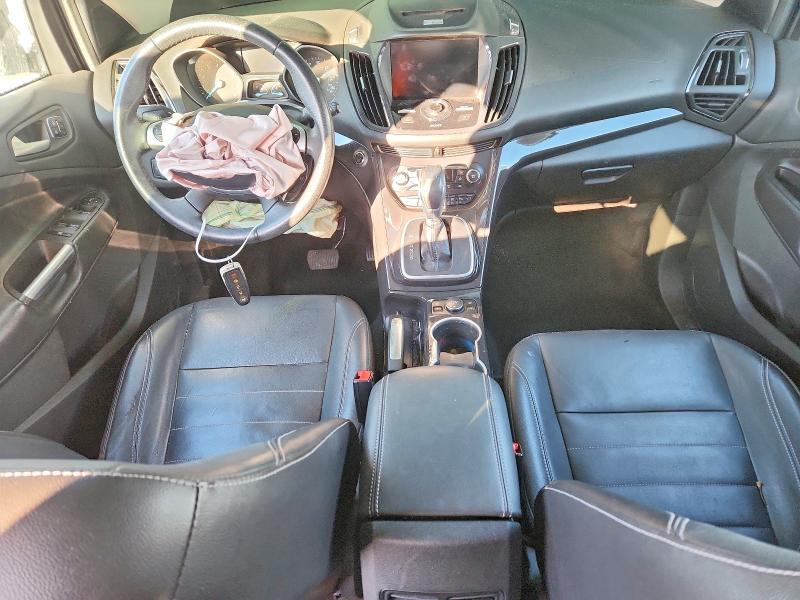 Photo 8 from auction – 2014 FORD ESCAPE TIT with VIN 1FMCU0JX3EUA54031