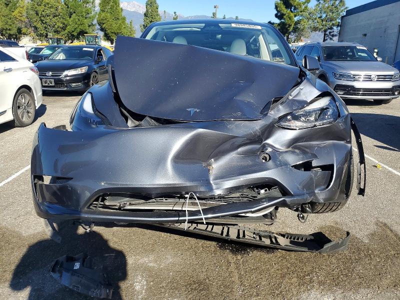 Photo 11 from auction – 2023 TESLA MODEL Y with VIN 7SAYGDED2PF947511