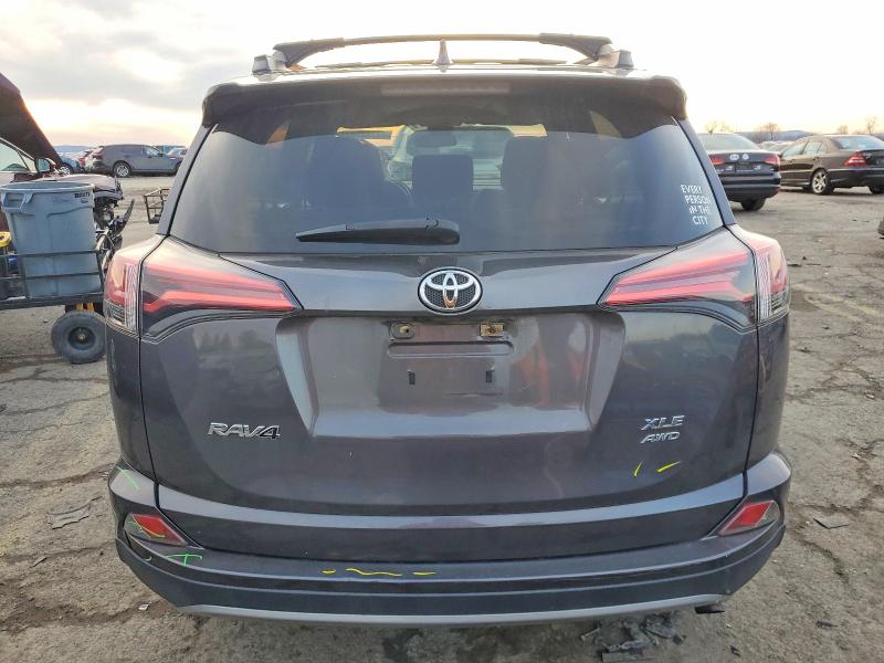 Photo 6 from auction – 2017 TOYOTA RAV4 XLE with VIN 2T3RFREV5HW671573