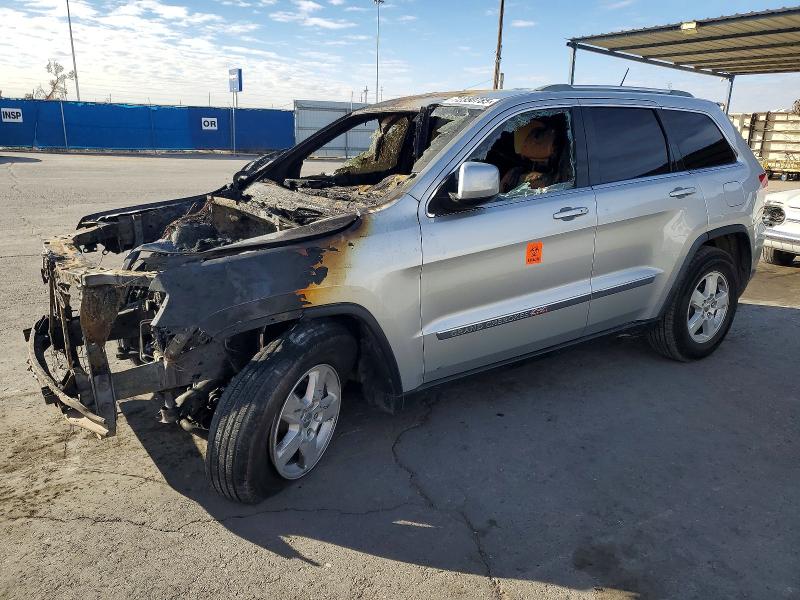 JEEP GRAND CHEROKEE 2011 with VIN 1J4RR4GGXBC579243 - Photo from auction