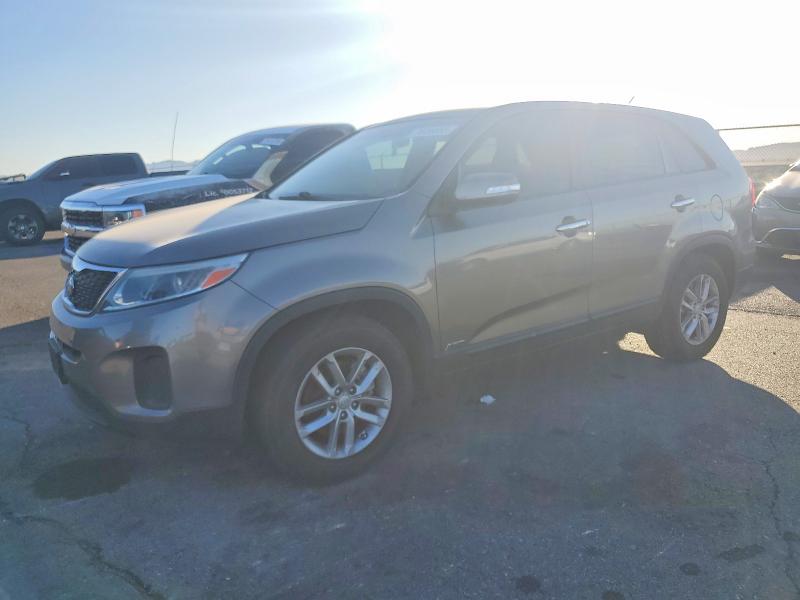 KIA SORENTO LX 2015 with VIN 5XYKTCA68FG567791 - Photo from auction
