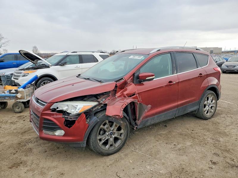 FORD ESCAPE TIT 2014 with VIN 1FMCU0JXXEUE12919 - Photo from auction