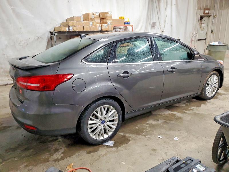 Photo 3 from auction – 2015 FORD FOCUS TITA with VIN 1FADP3J28FL297837