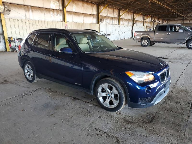 Photo 4 from auction – 2014 BMW X1 SDRIVE2 with VIN WBAVM1C57EVW56436