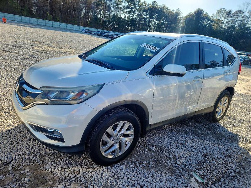 Photo 1 from auction – 2015 HONDA CR-V EXL with VIN 5J6RM3H79FL009795