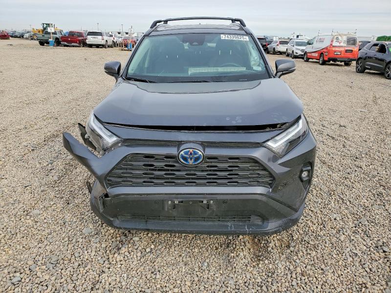 Photo 5 from auction – 2022 TOYOTA RAV4 XLE P with VIN JTMB6RFV0ND055739