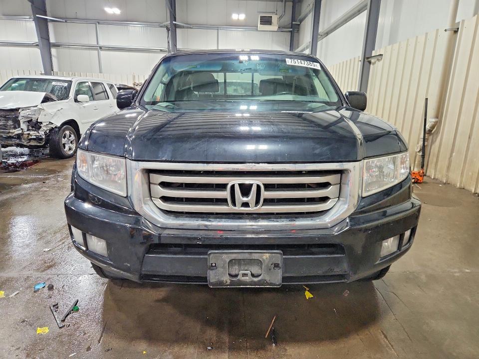 Photo 5 from auction – 2012 HONDA RIDGELINE with VIN 5FPYK1F59CB003806