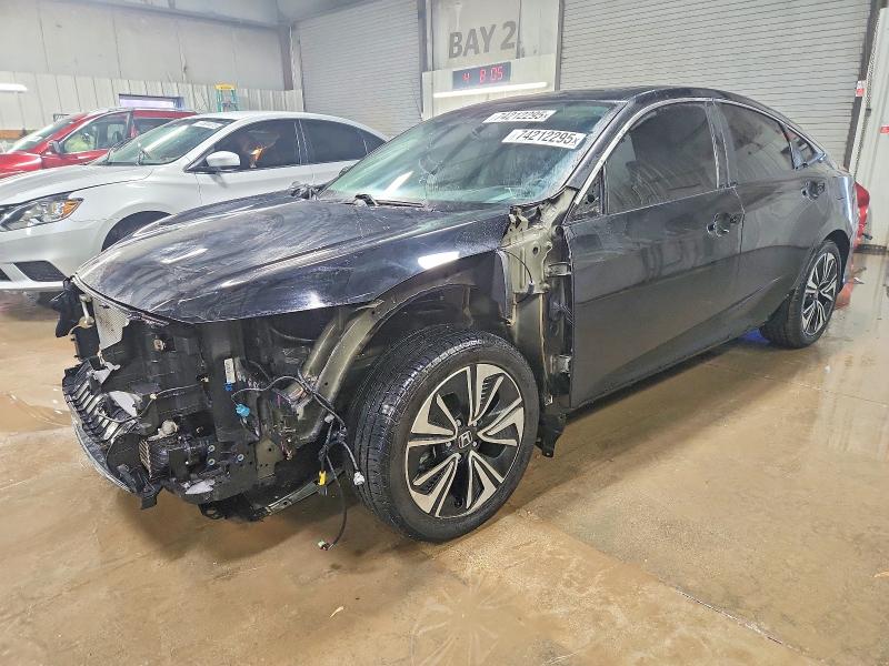 HONDA CIVIC EXL 2017 with VIN 19XFC1F75HE028732 - Photo from auction