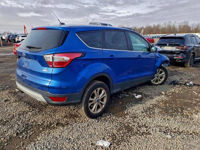 Photo 3 from auction – 2017 FORD ESCAPE with VIN 1FMCU9GD0HUC06224