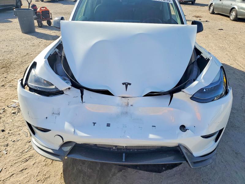 Photo 12 from auction – 2023 TESLA MODEL Y with VIN 7SAYGDEF5PF669415