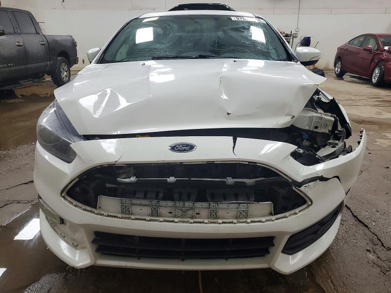Photo 5 from auction – 2016 FORD FOCUS ST with VIN 1FADP3L95GL305291