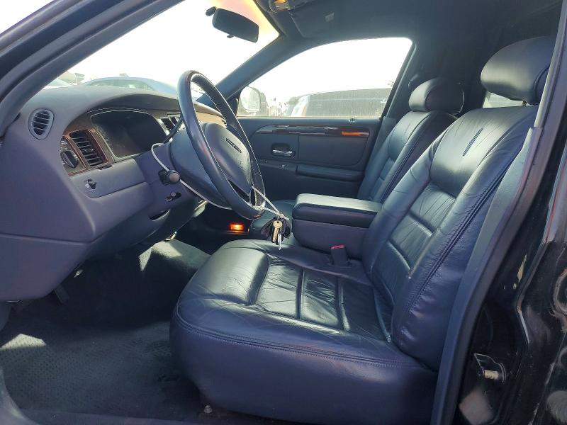 Photo 7 from auction – 2000 LINCOLN TOWN CAR E with VIN 1LJFM81W9YY795947