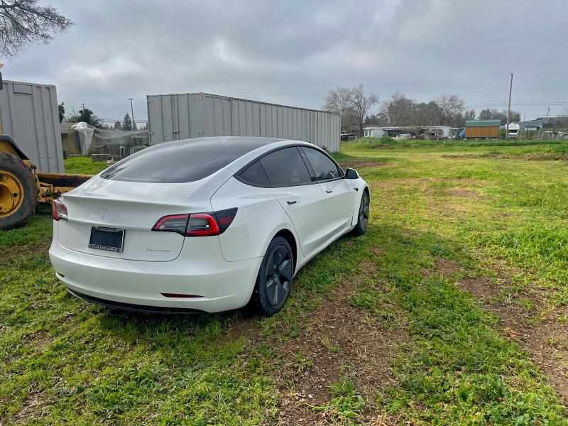 Photo 12 from auction – 2022 TESLA MODEL 3 with VIN 5YJ3E1EBXNF250465