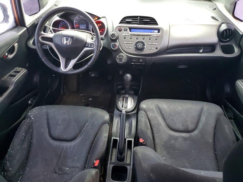 Photo 8 from auction – 2009 HONDA FIT with VIN JHMGE88469S075839