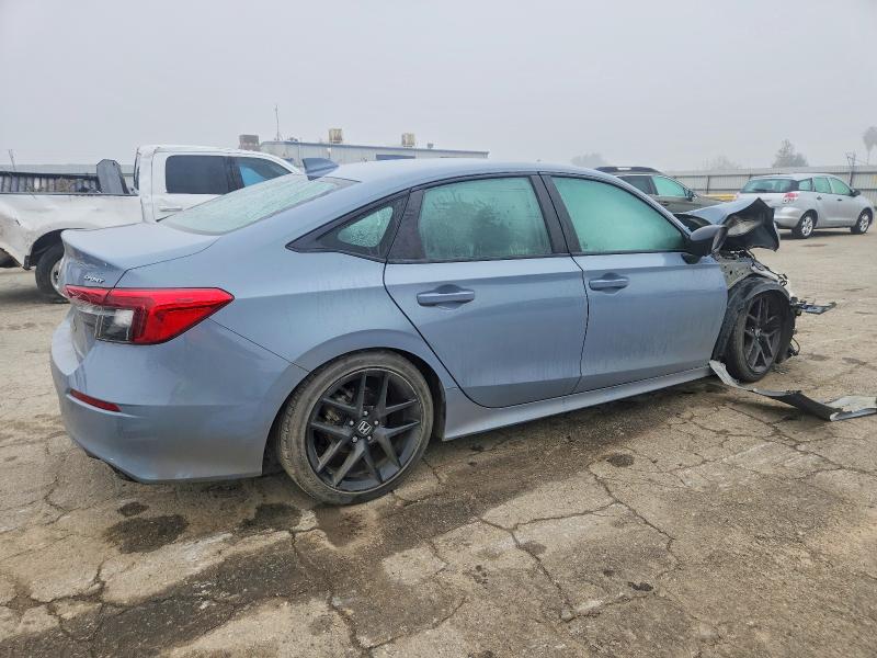 Photo 3 from auction – 2023 HONDA CIVIC SPOR with VIN 2HGFE2F50PH519244