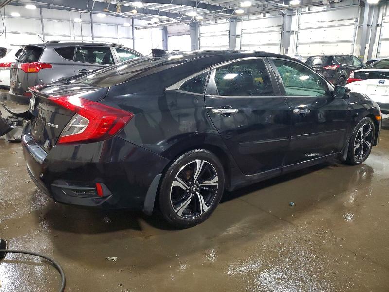 Photo 3 from auction – 2018 HONDA CIVIC TOUR with VIN 19XFC1F97JE001426