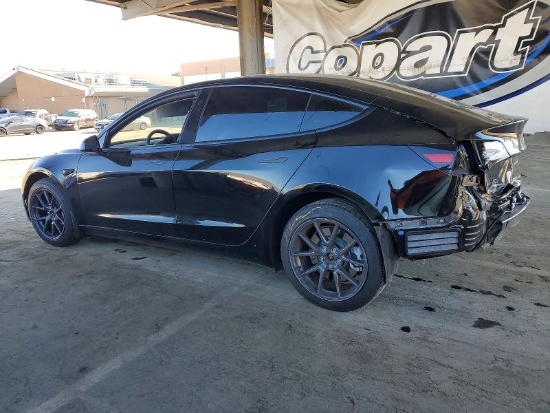 Photo 2 from auction – 2023 TESLA MODEL 3 with VIN 5YJ3E1EAXPF543714