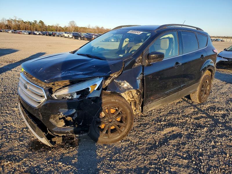 FORD ESCAPE SE 2018 with VIN 1FMCU0GD8JUC10751 - Photo from auction