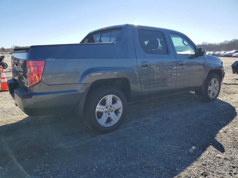 Photo 3 from auction – 2011 HONDA RIDGELINE with VIN 5FPYK1F56BB452715