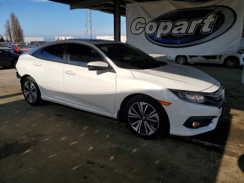 Photo 4 from auction – 2017 HONDA CIVIC EXL with VIN 2HGFC1F73HH646086