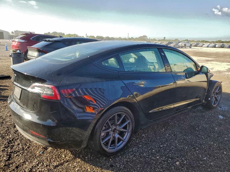 Photo 3 from auction – 2022 TESLA MODEL 3 with VIN 5YJ3E1EB5NF285592