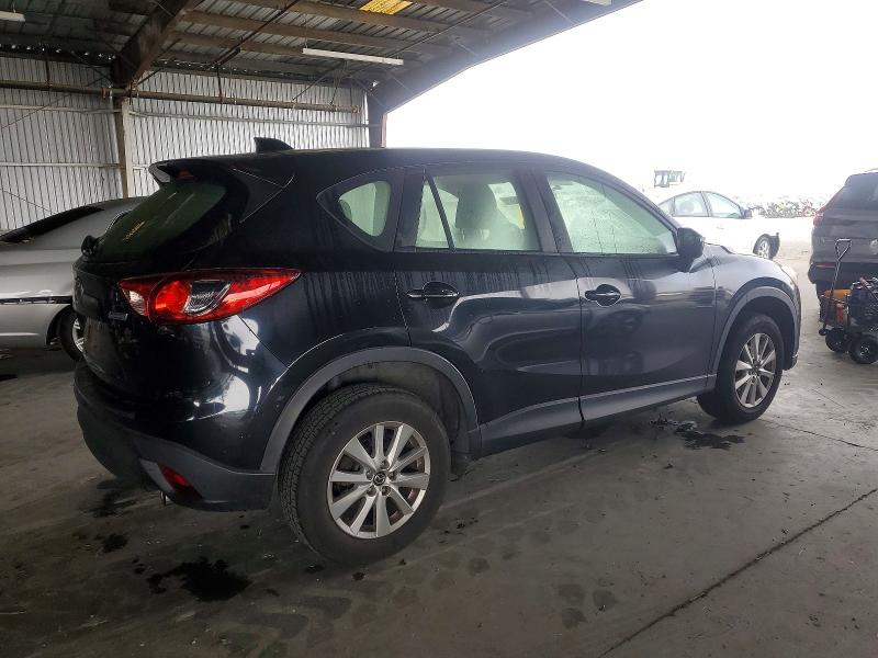 Photo 3 from auction – 2015 MAZDA CX-5 with VIN JM3KE2BE5F0527725