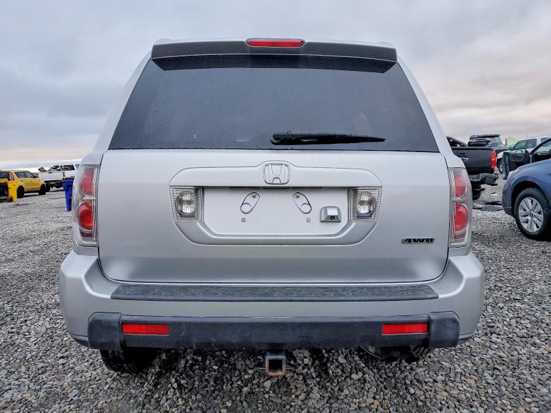 Photo 6 from auction – 2006 HONDA PILOT EX with VIN 2HKYF18726H564303