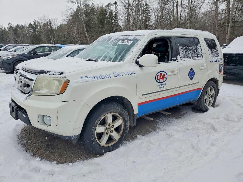 HONDA PILOT TOUR 2011 with VIN 5FNYF4H94BB505619 - Photo from auction