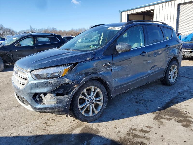 FORD ESCAPE SE 2018 with VIN 1FMCU9GD6JUB03198 - Photo from auction