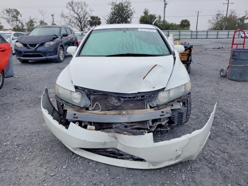 Photo 5 from auction – 2011 HONDA CIVIC LX with VIN 19XFA1F5XBE018578
