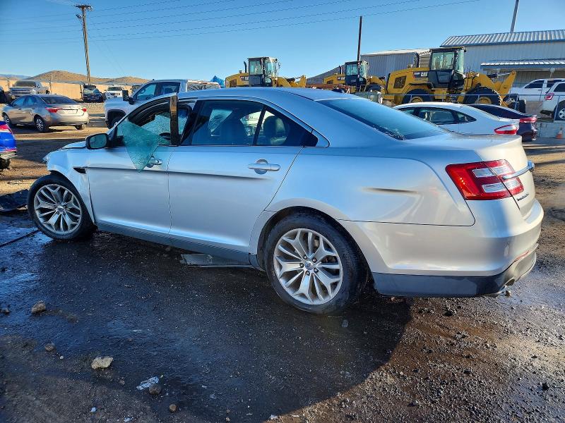 Photo 2 from auction – 2014 FORD TAURUS LIM with VIN 1FAHP2F85EG149600