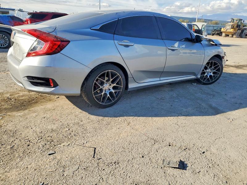 Photo 3 from auction – 2019 HONDA CIVIC with VIN 19XFC2F65KE023230