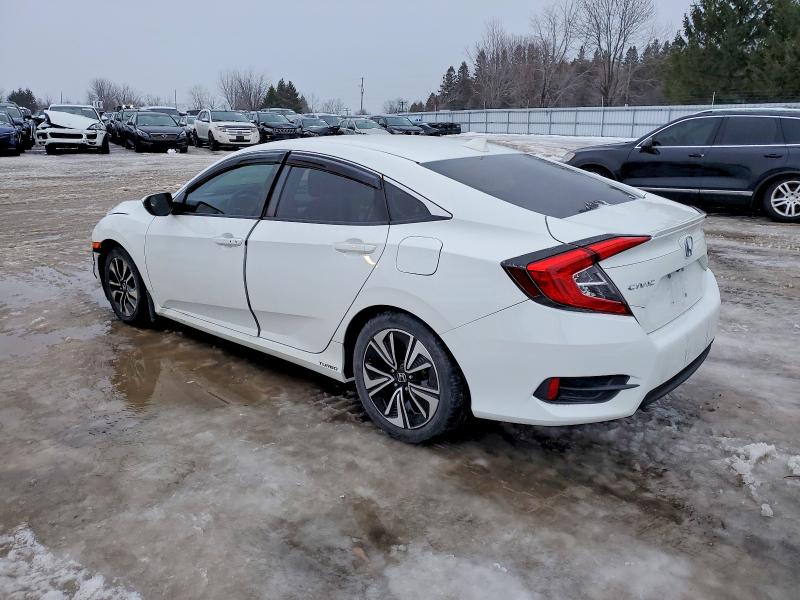 Photo 2 from auction – 2017 HONDA CIVIC EX with VIN 2HGFC1F41HH106435