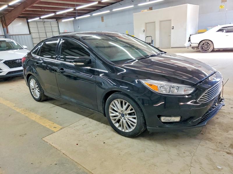 Photo 4 from auction – 2018 FORD FOCUS TITA with VIN 1FADP3J21JL295985