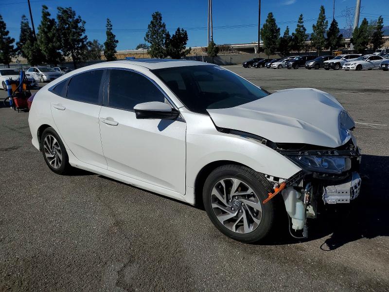 Photo 4 from auction – 2018 HONDA CIVIC EX with VIN 19XFC2F70JE208499