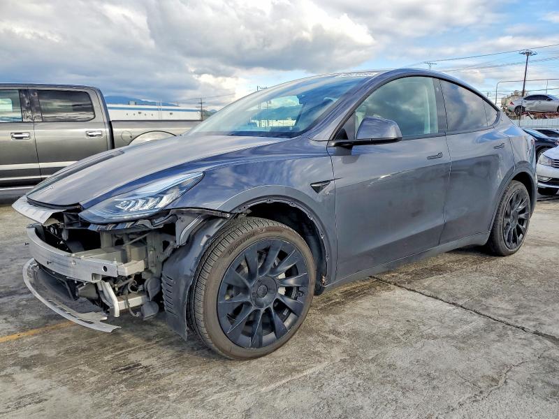TESLA MODEL Y 2023 with VIN 7SAYGDEE3PF597976 - Photo from auction