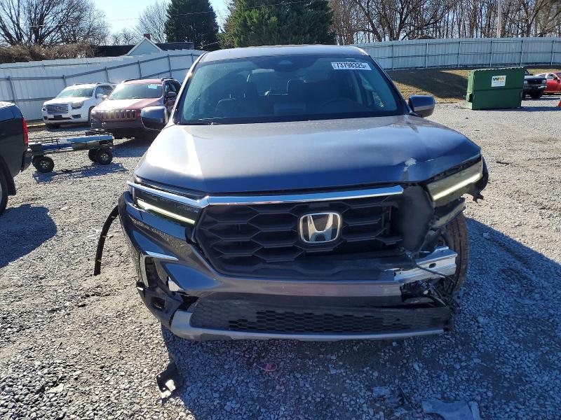 Photo 5 from auction – 2023 HONDA PILOT EXL with VIN 5FNYG1H56PB006255