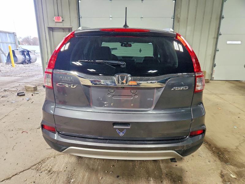Photo 6 from auction – 2015 HONDA CR-V EXL with VIN 2HKRM4H71FH695458