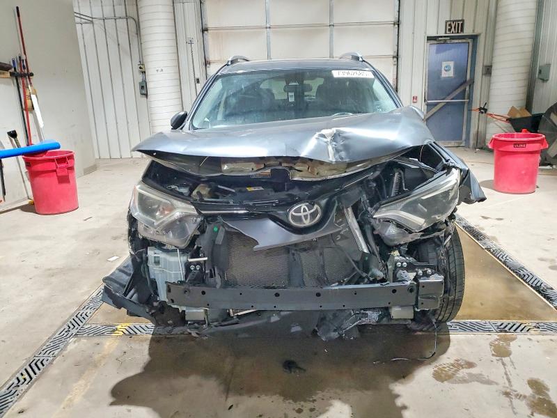 Photo 5 from auction – 2017 TOYOTA RAV4 XLE with VIN JTMRFREV5HD211567