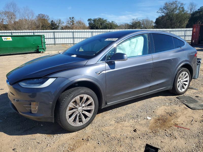 TESLA MODEL X 2020 with VIN 5YJXCDE21LF304094 - Photo from auction