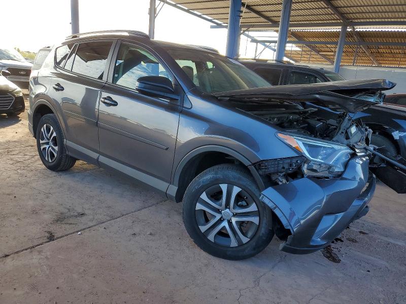 Photo 4 from auction – 2017 TOYOTA RAV4 LE with VIN JTMZFREV1HJ123472