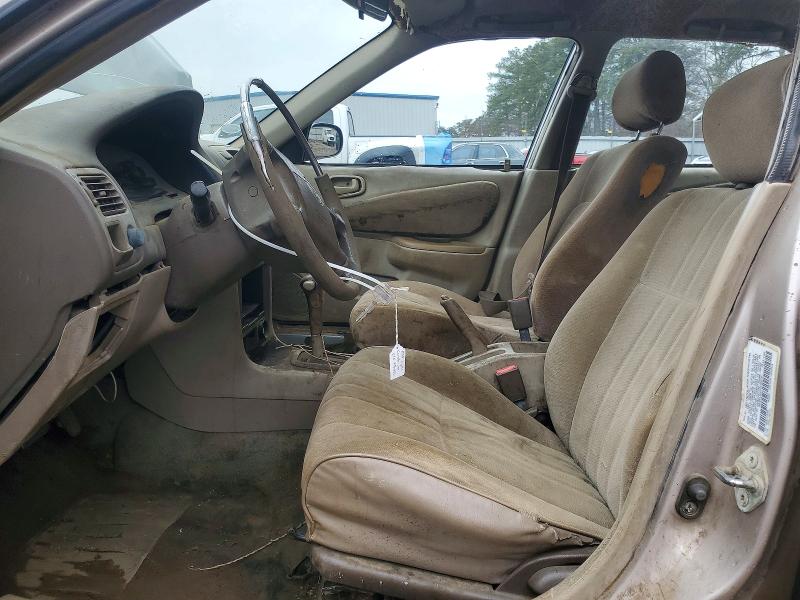 Photo 7 from auction – 1999 TOYOTA COROLLA with VIN 1NXBR12E4XZ296636