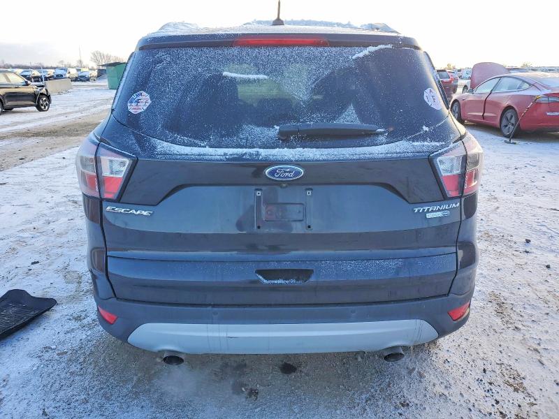 Photo 6 from auction – 2017 FORD ESCAPE TIT with VIN 1FMCU9JD9HUE96195