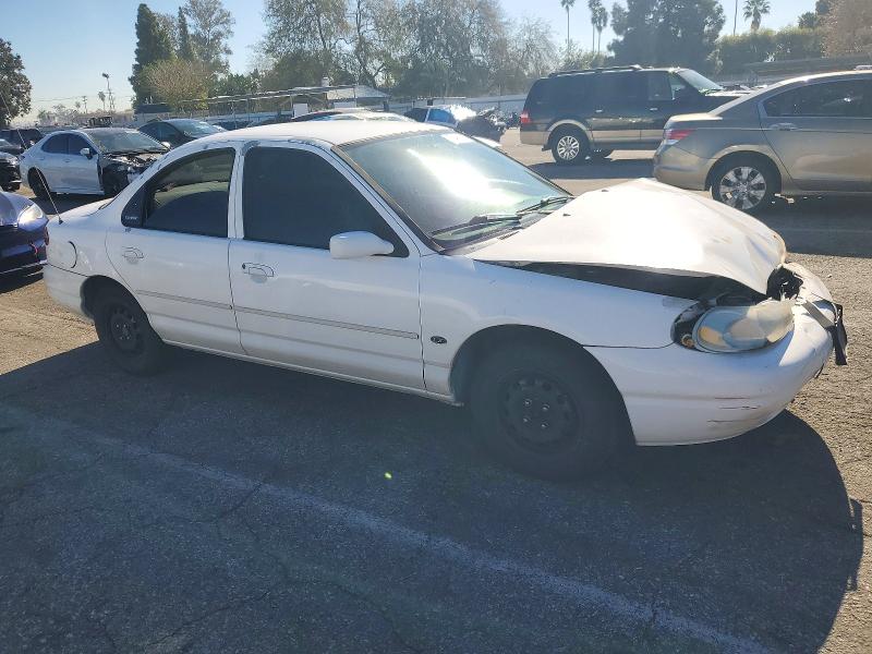 Photo 4 from auction – 1999 FORD CONTOUR LX with VIN 1FAFP6531XK182565