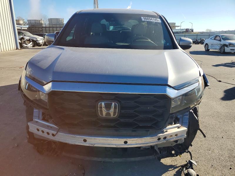 Photo 5 from auction – 2022 HONDA PASSPORT E with VIN 5FNYF8H50NB008642