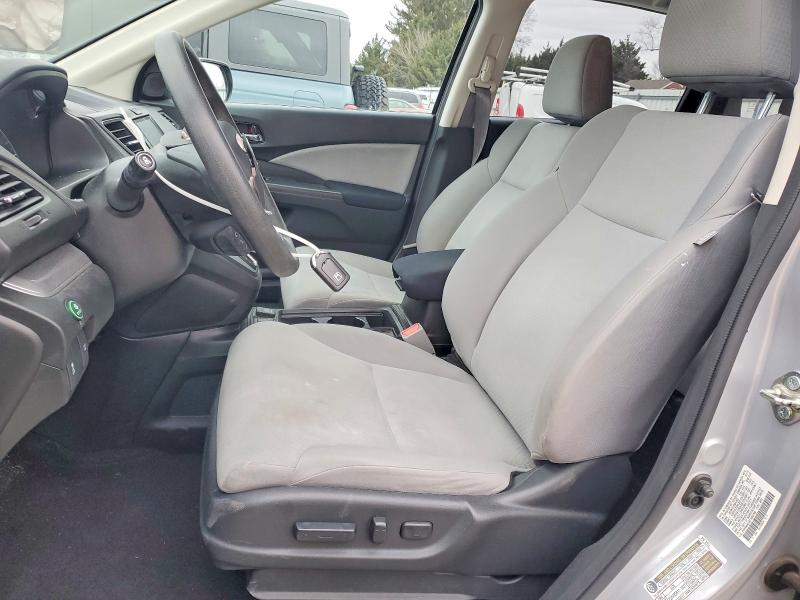Photo 7 from auction – 2015 HONDA CR-V with VIN 2HKRM4H56FH682509
