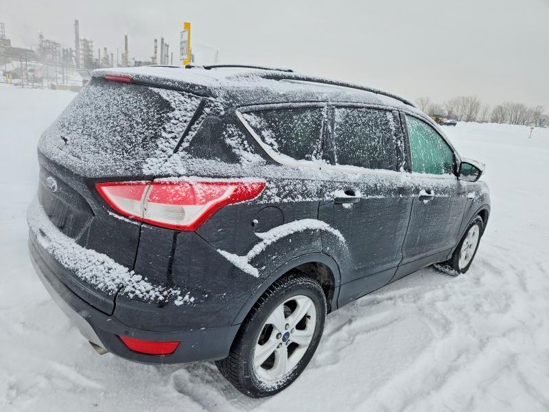 Foto 3 de la subasta – 2015 FORD ESCAPE SE con VIN 1FMCU9GXXFUC69841