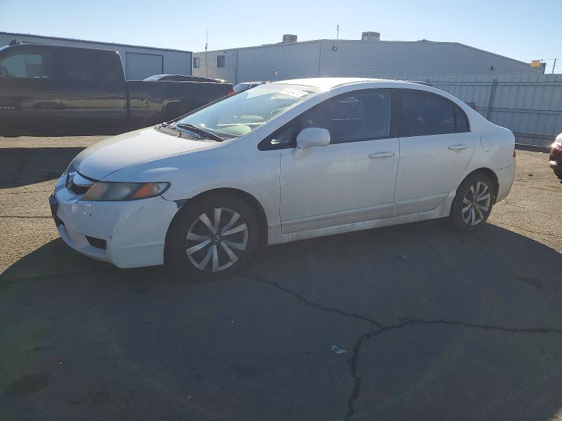 HONDA CIVIC LX 2011 with VIN 19XFA1F50BE047622 - Photo from auction